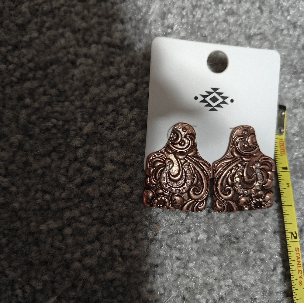 Elegant Copper-Toned Earrings Cow Tag With Horseshoe Sparkle Center